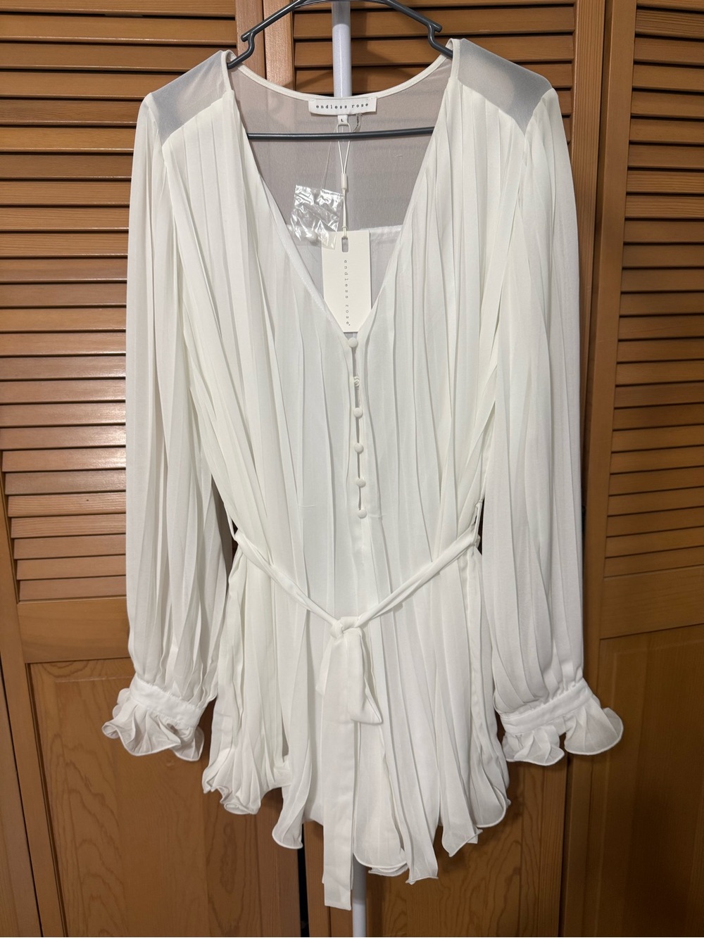 White Pleated Long Sleeve Romper
